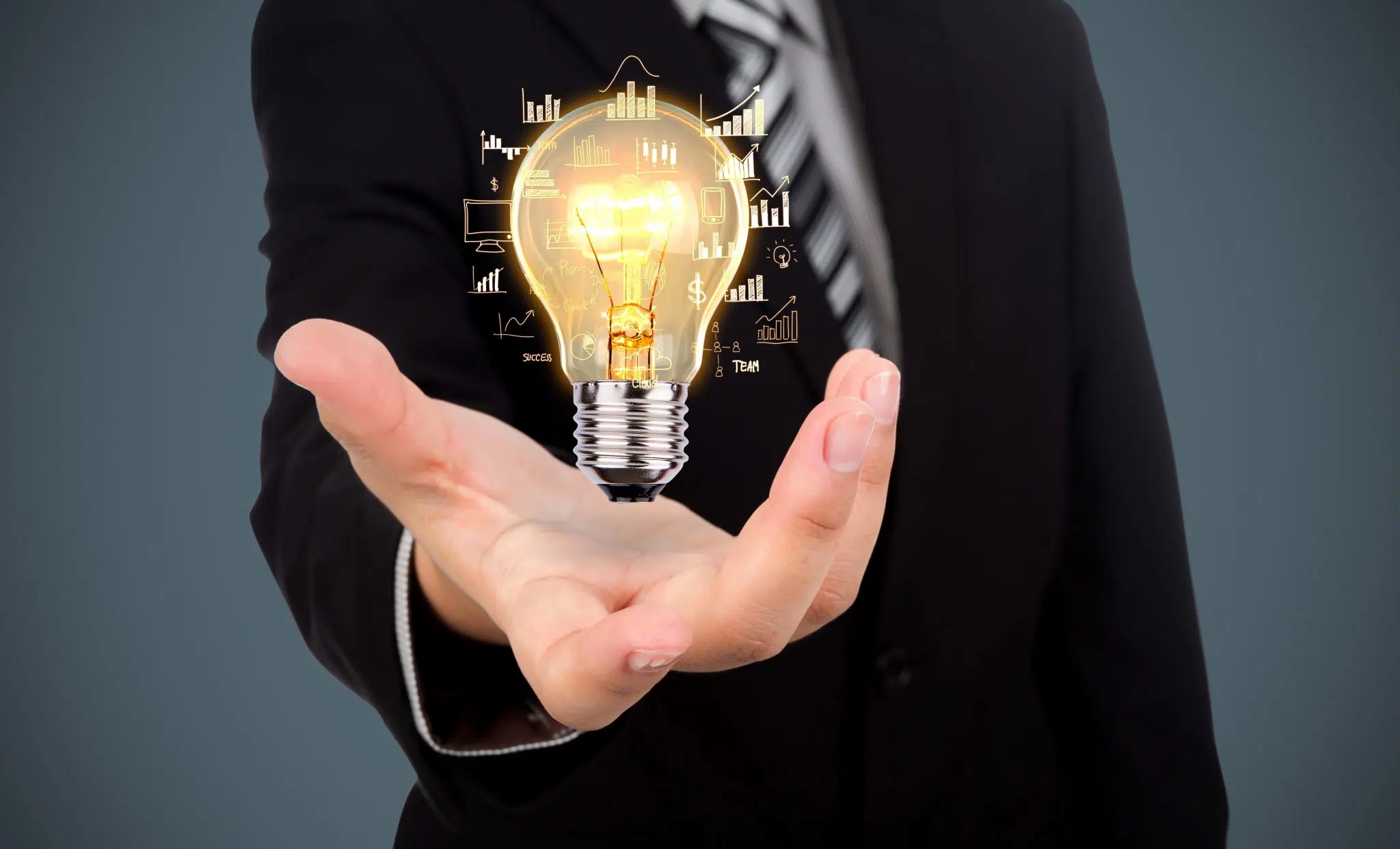 /api/media/file/businessman-with-a-light-bulb-in-his-hand-2048x1242.jpg.webp
